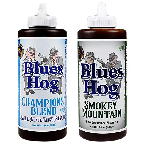 Two bottles of Blues Hog BBQ Sauce, Champions' Blend and Smokey Mountain